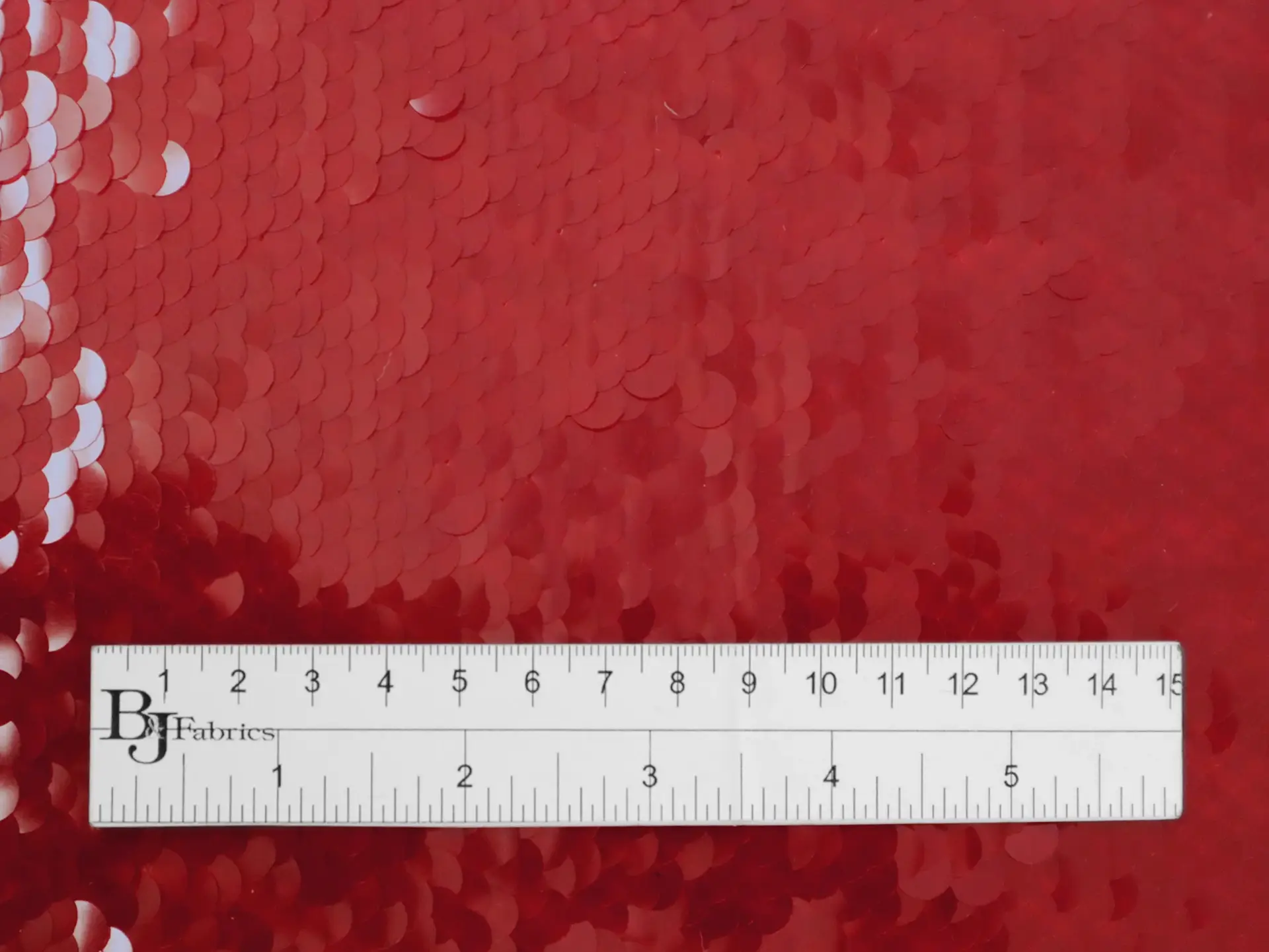 Transparent Mini-Paillettes on Stretch Tulle in Red