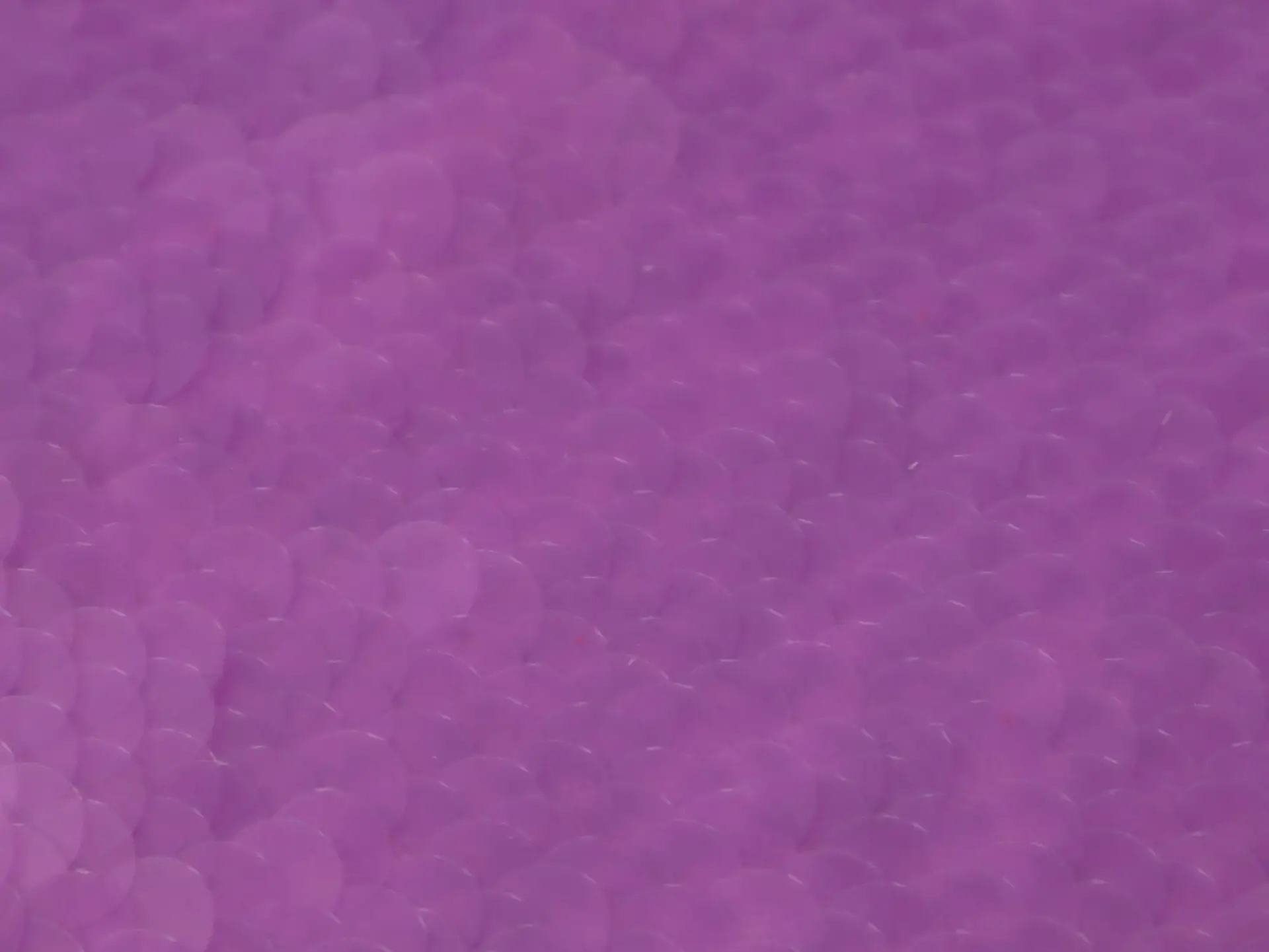 Transparent Mini-Paillettes on Stretch Tulle in Purple