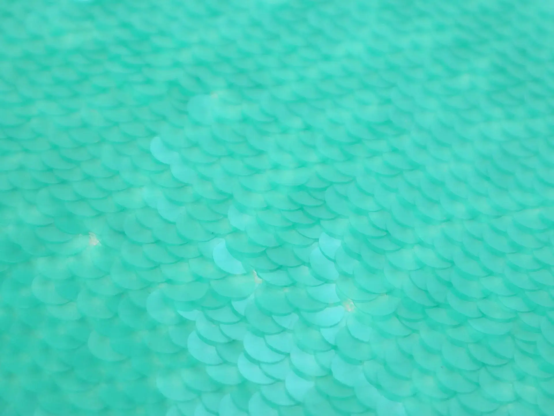 Transparent Mini-Paillettes on Stretch Tulle in Aqua