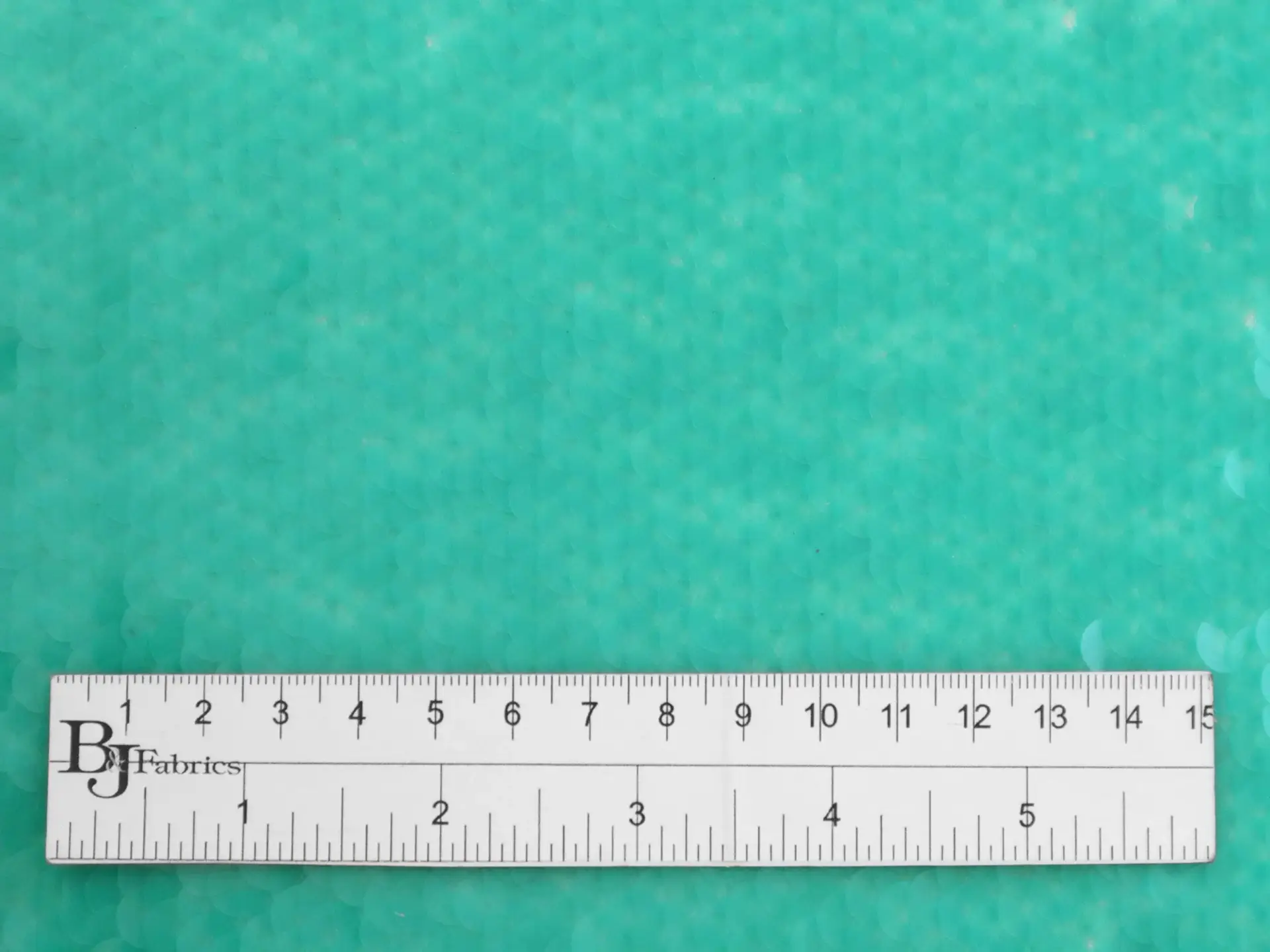 Transparent Mini-Paillettes on Stretch Tulle in Aqua