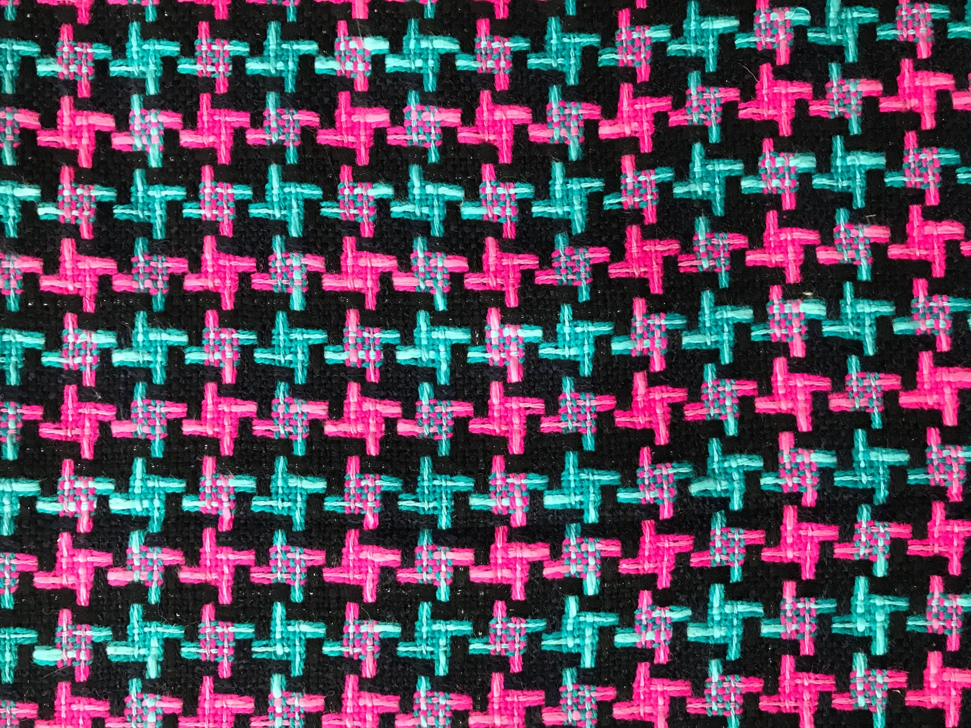 tweed with herringbone patterns in turquoise and fuchsia