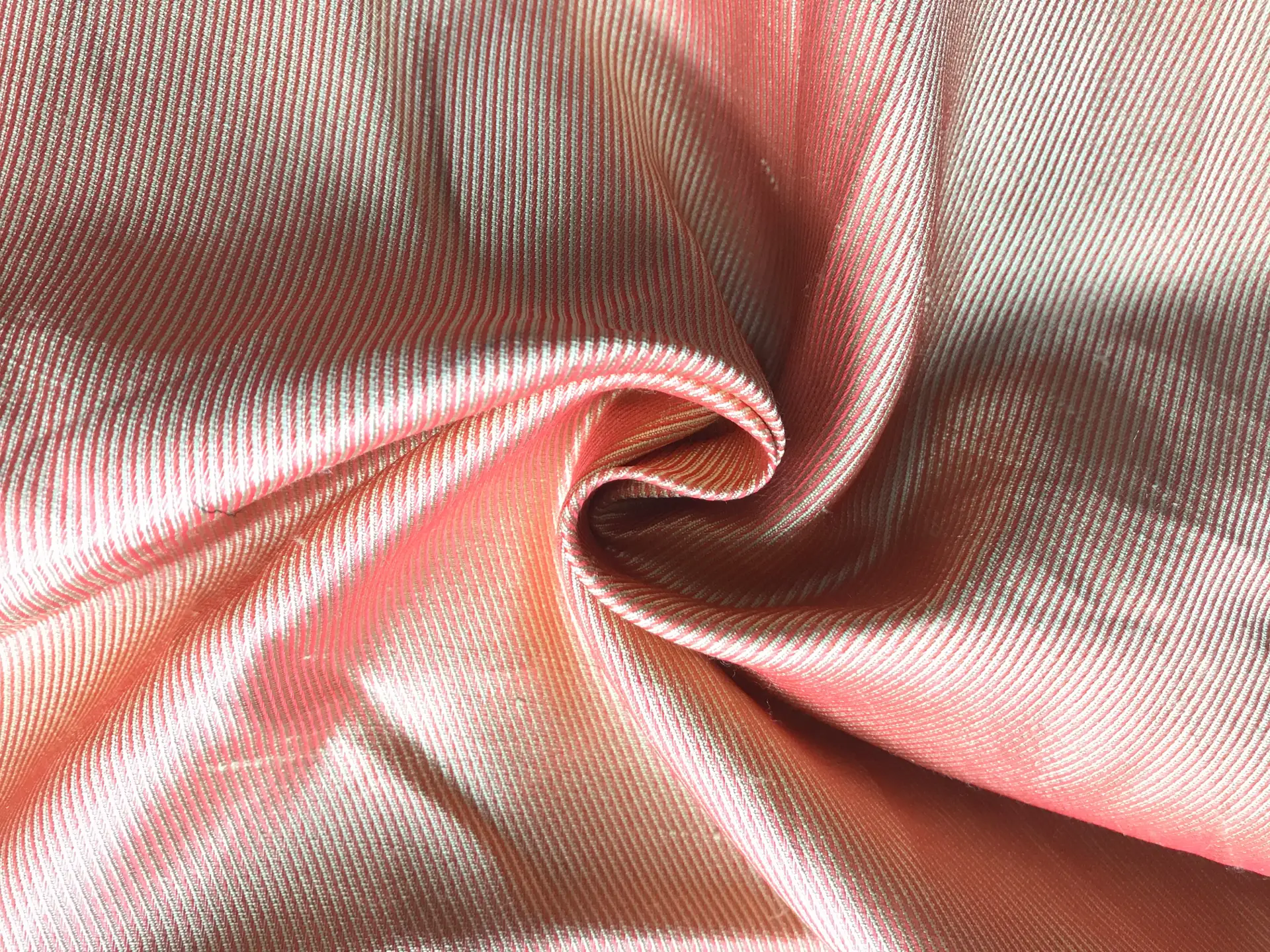 silk taffeta in a swirl to show the iridescence
