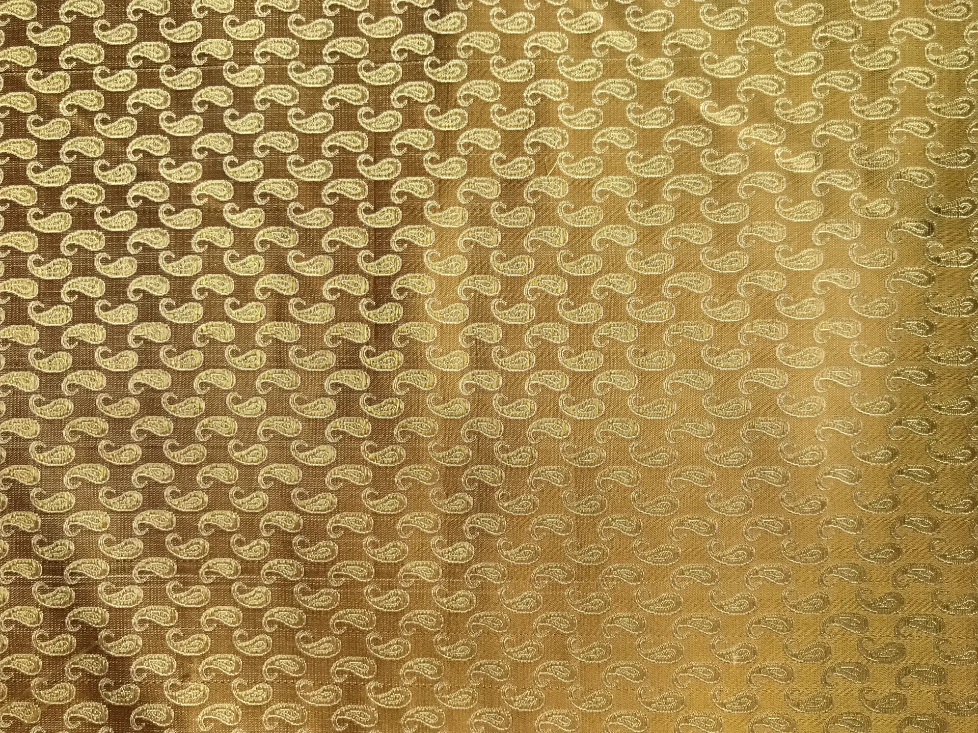 gold metallic silk brocade with repeating gold paisleys