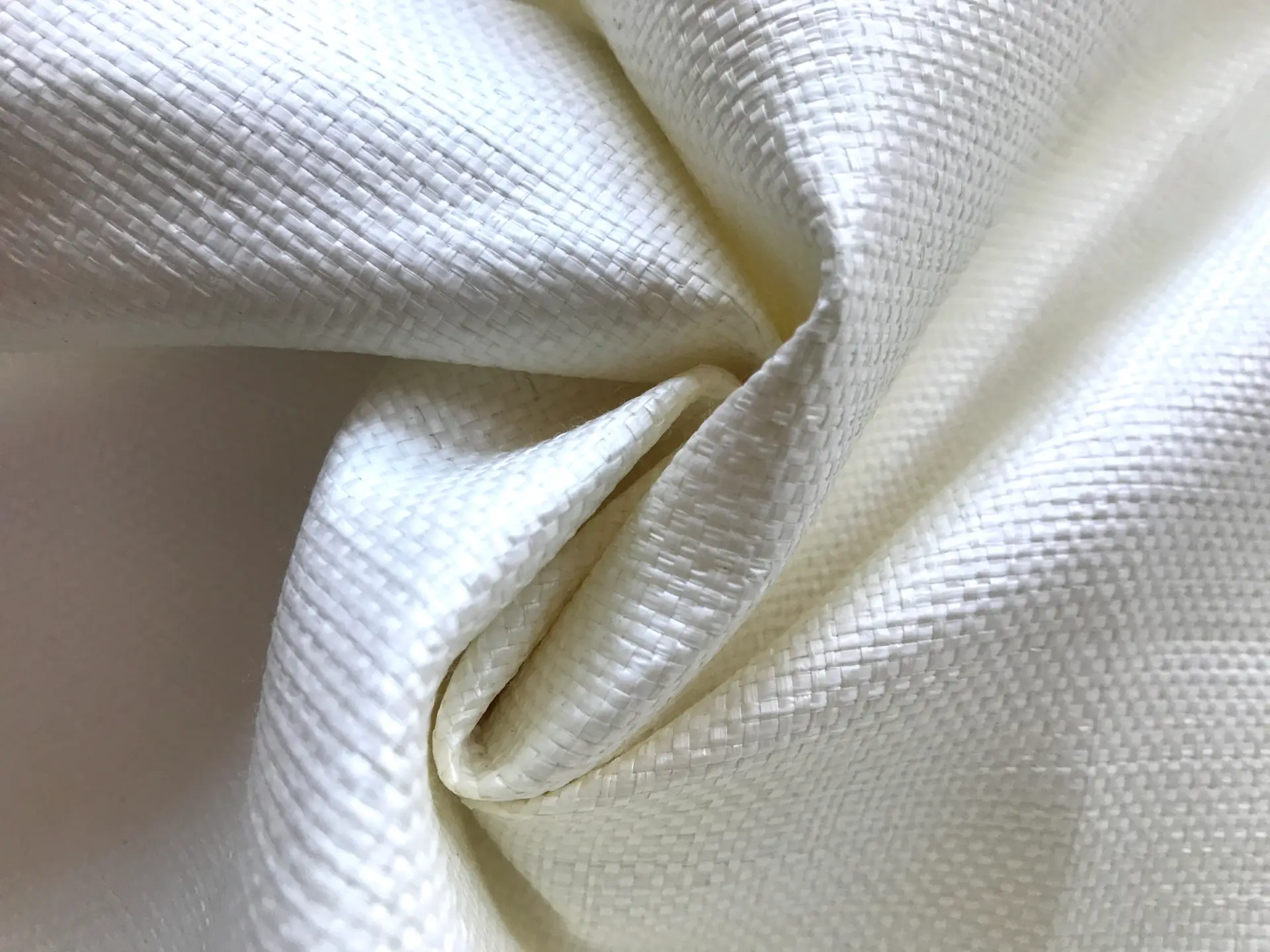 white raffia scrunched up to show weight and texture