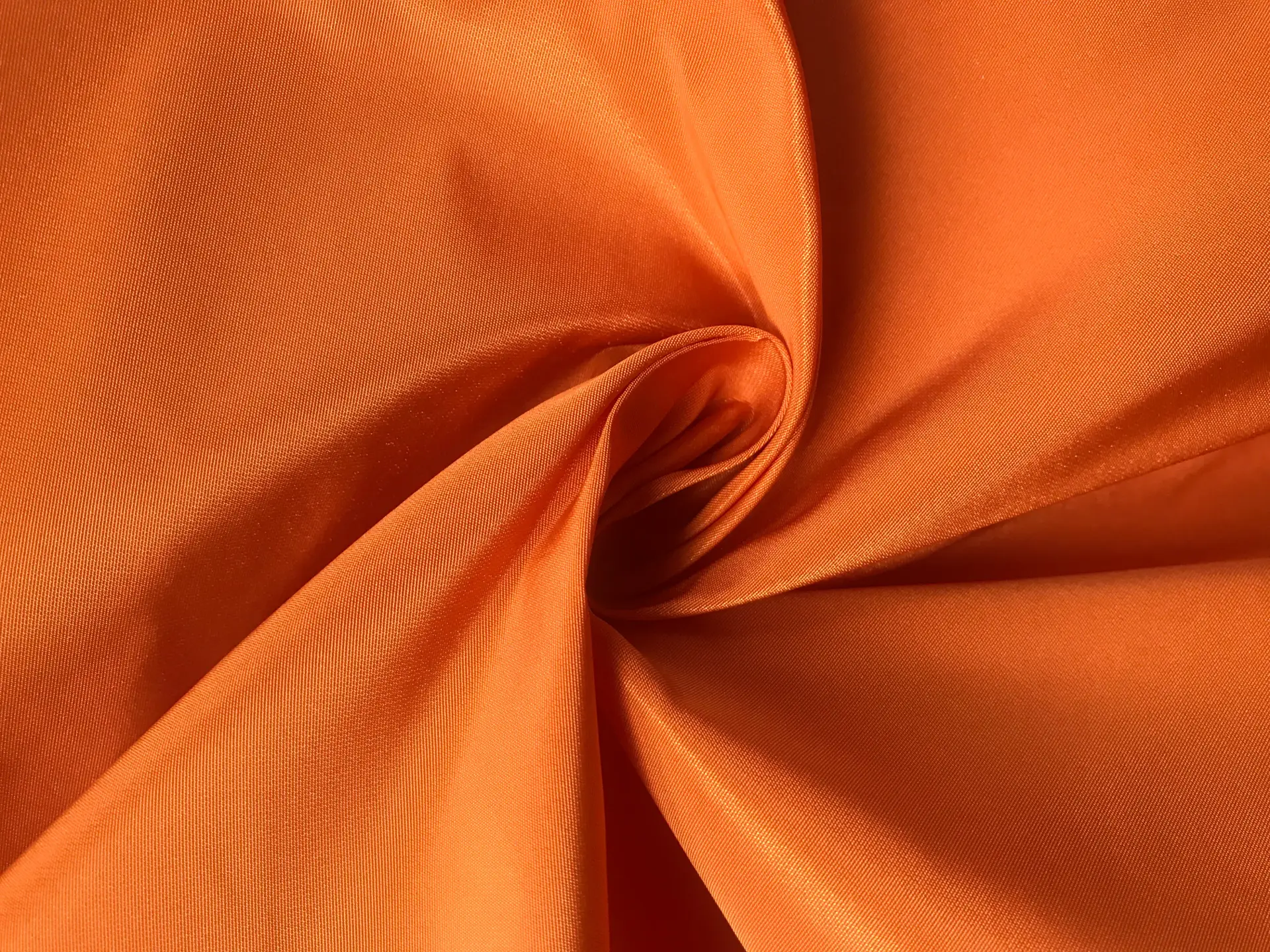 amber poly taffeta in a swirl