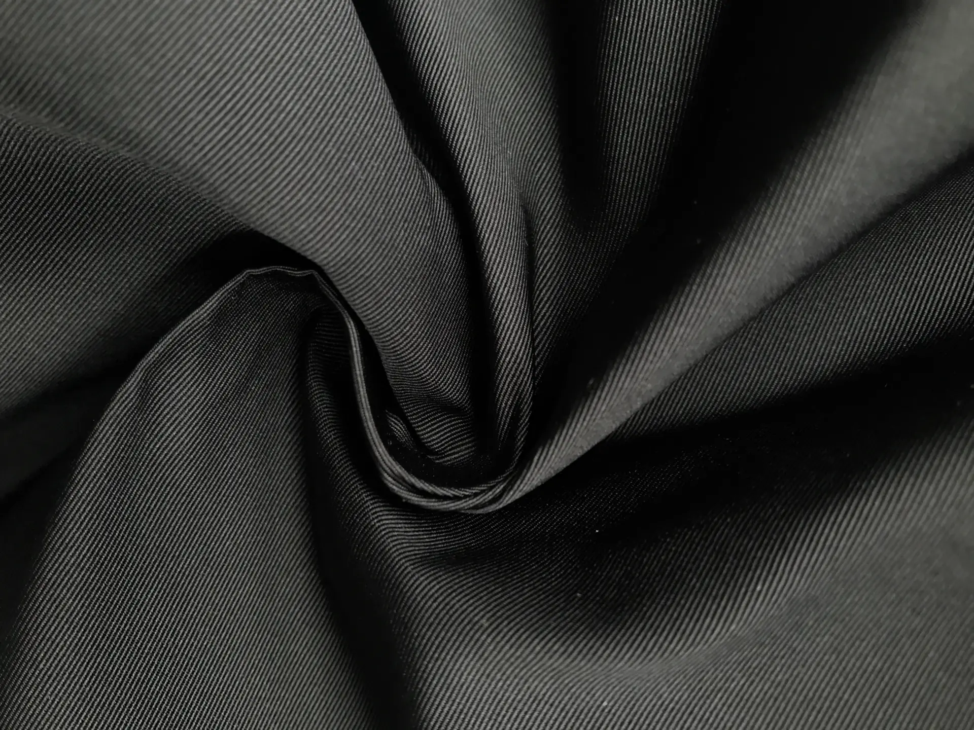 black poly gros de londres in a swirl