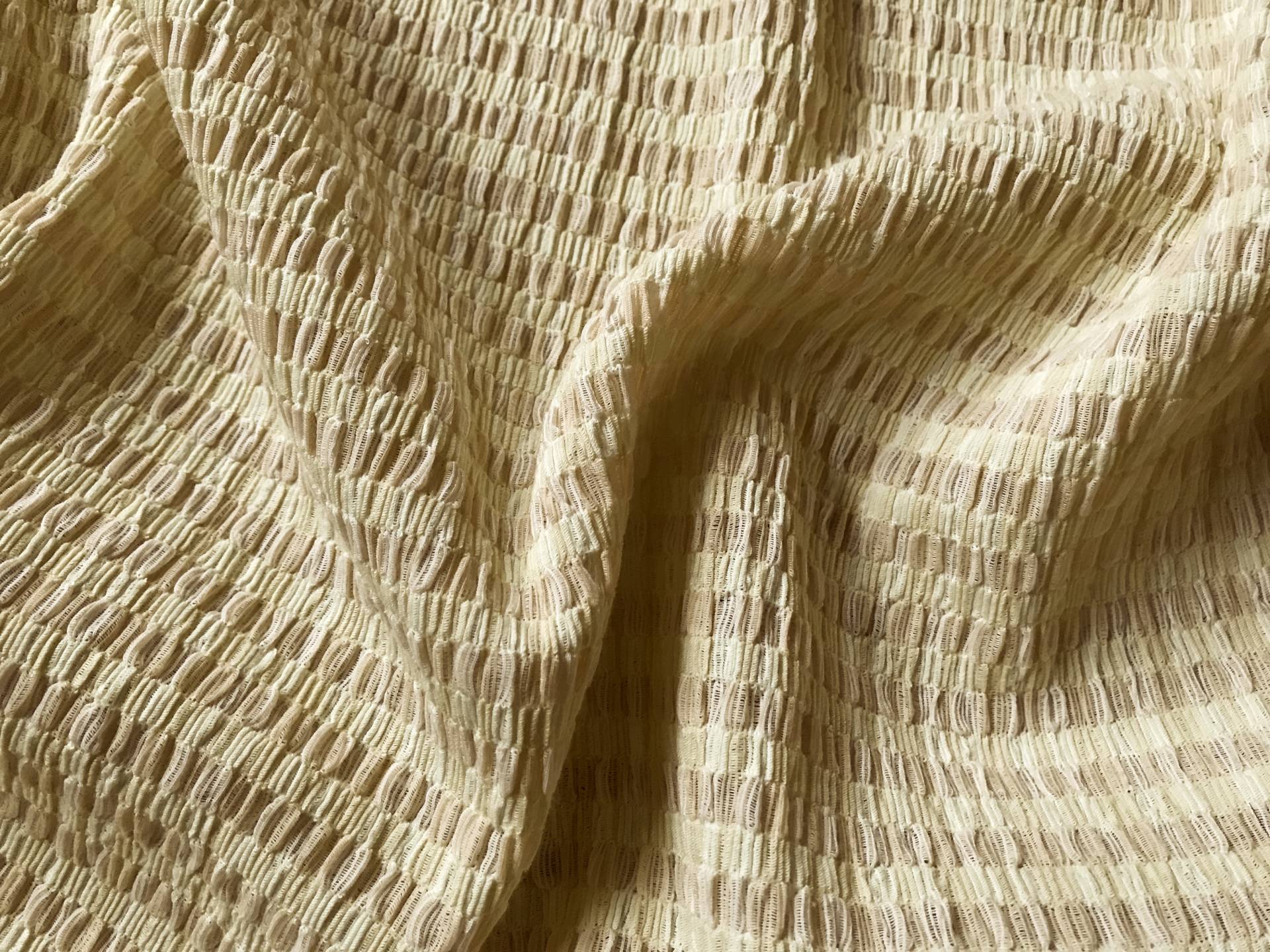 butter and peach poly popcorn knit