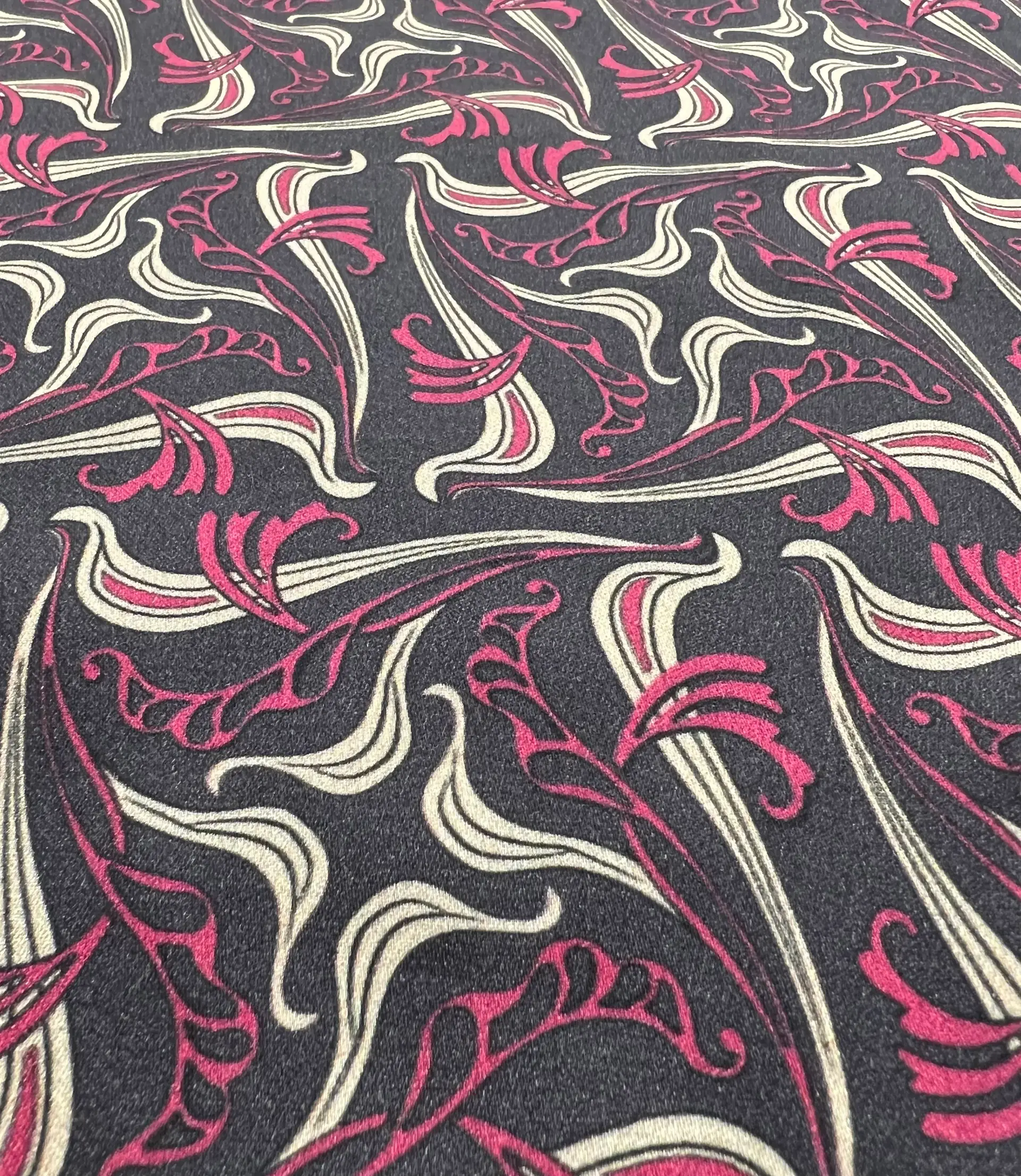 Printed Viscose challis Sateen On Charcoal Ground