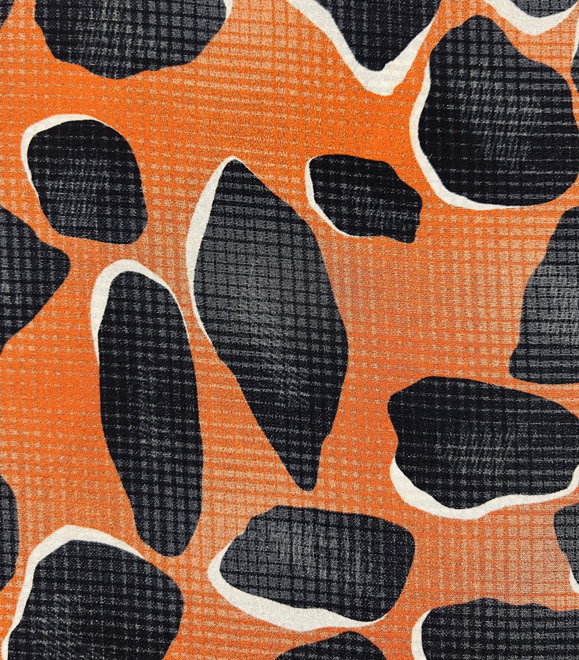 Printed Stretch Silk Charmeuse on Rust Ground