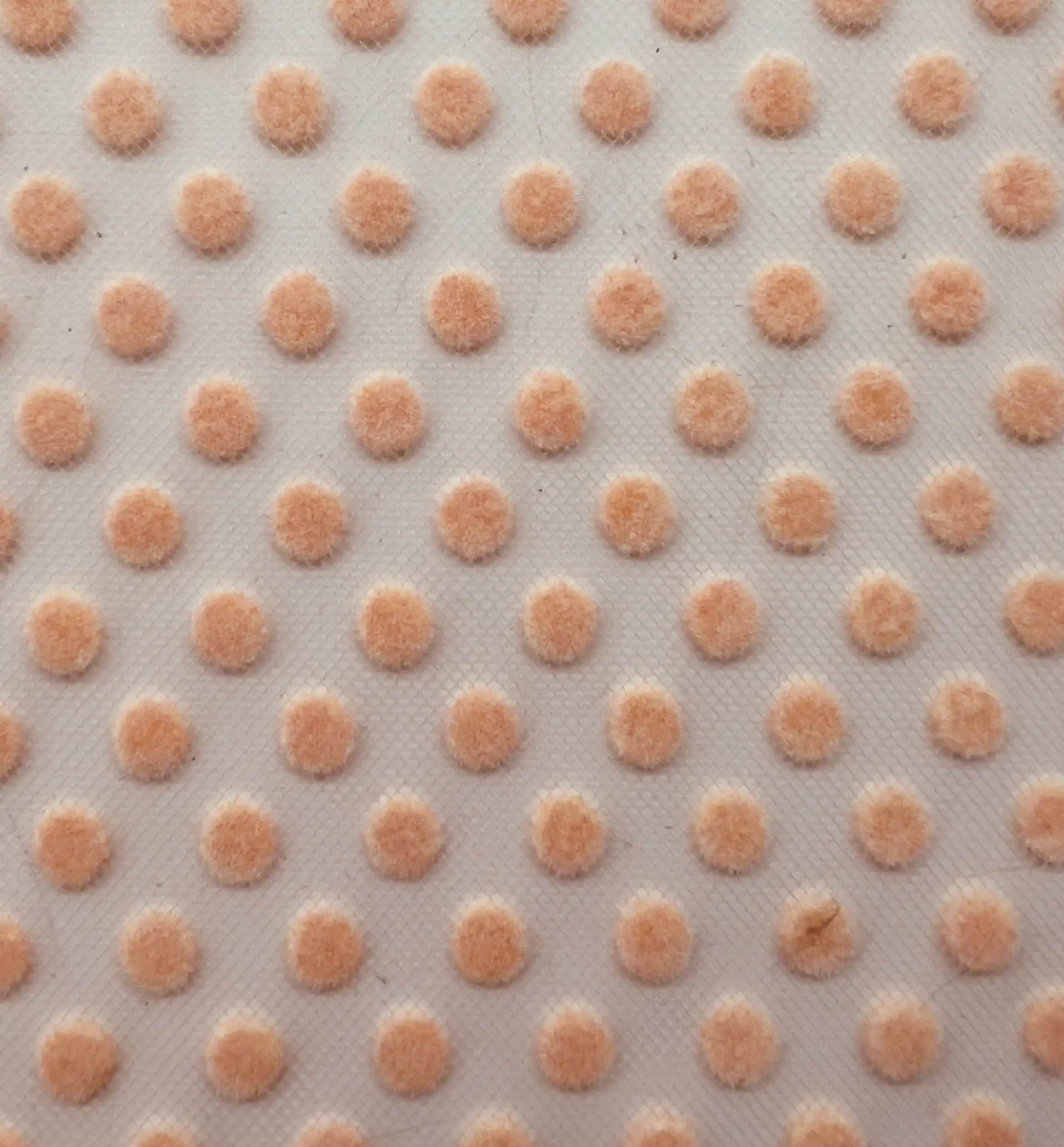 Flocking on tulle in Peach