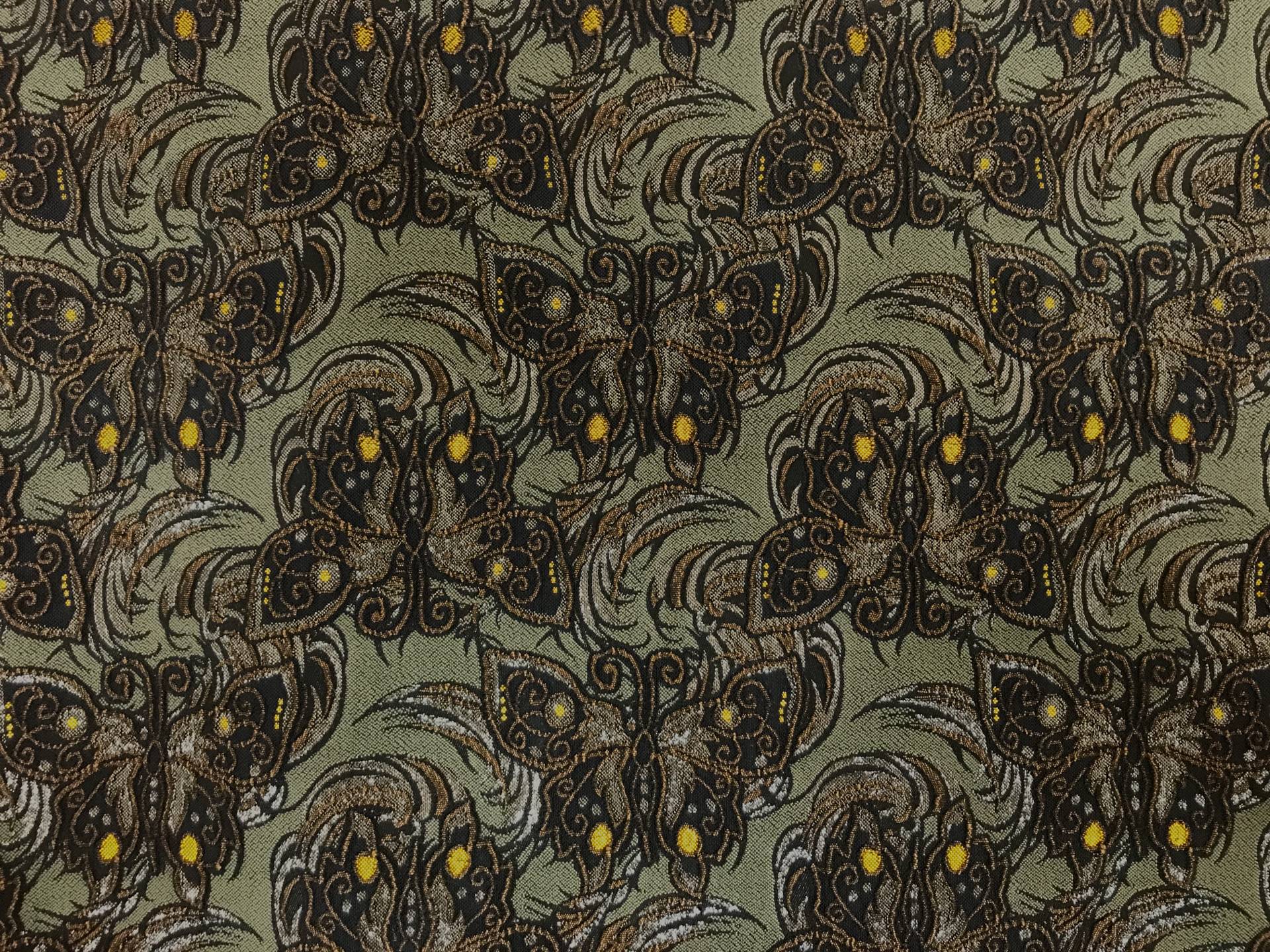 dark green stretch brocade with repeating butterfly pattern