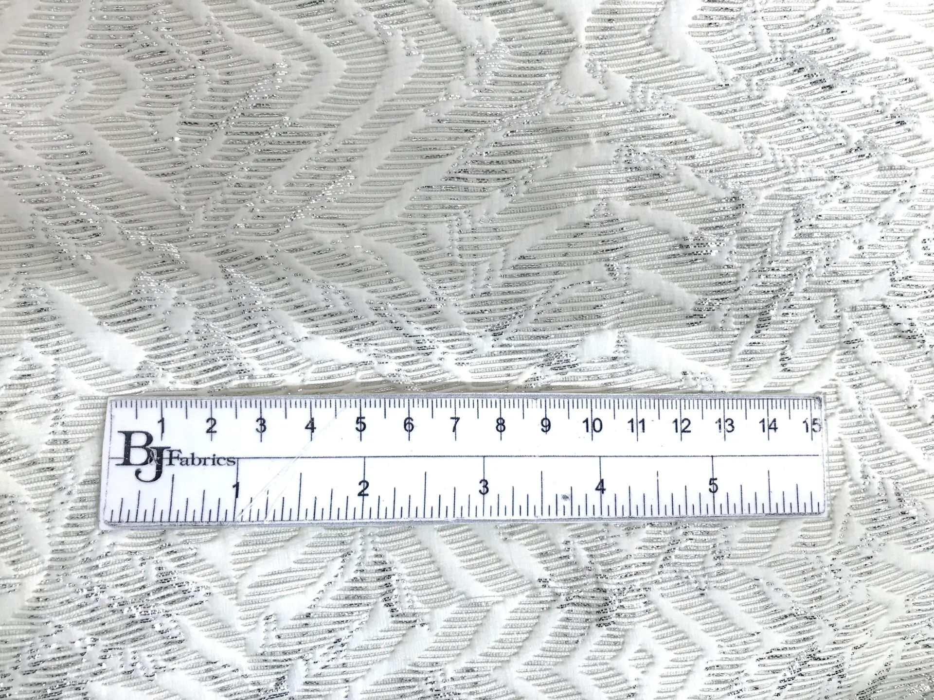 Italian Eggshell Brocade with Abstract Leaf Patterns with ruler to show scale