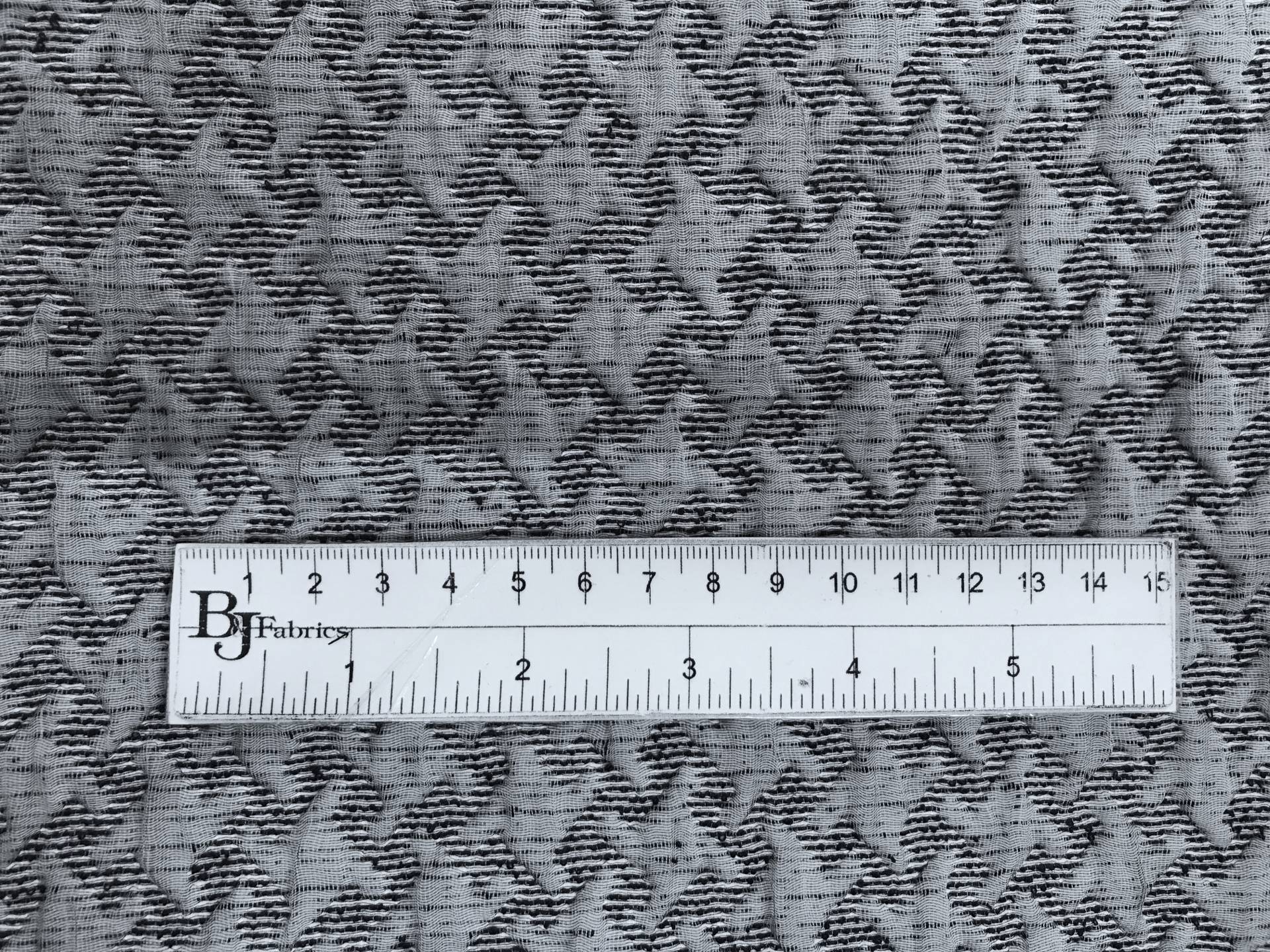 Silk Blend Novelty Brocade with Houndstooth Pattern with ruler to show scale