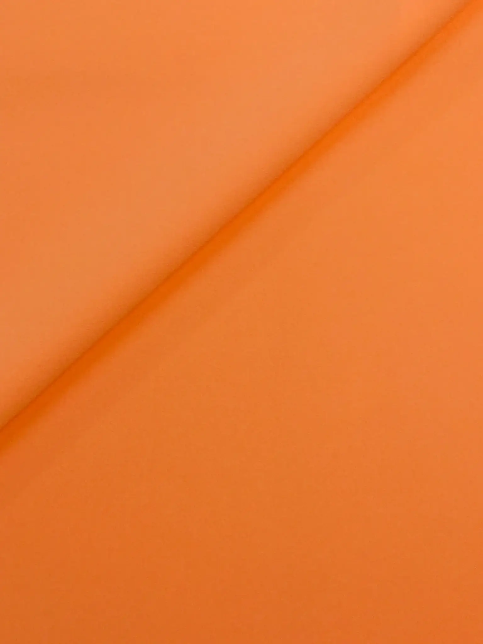 Polyester and Spandex Stretch Crepe in Neon Orange