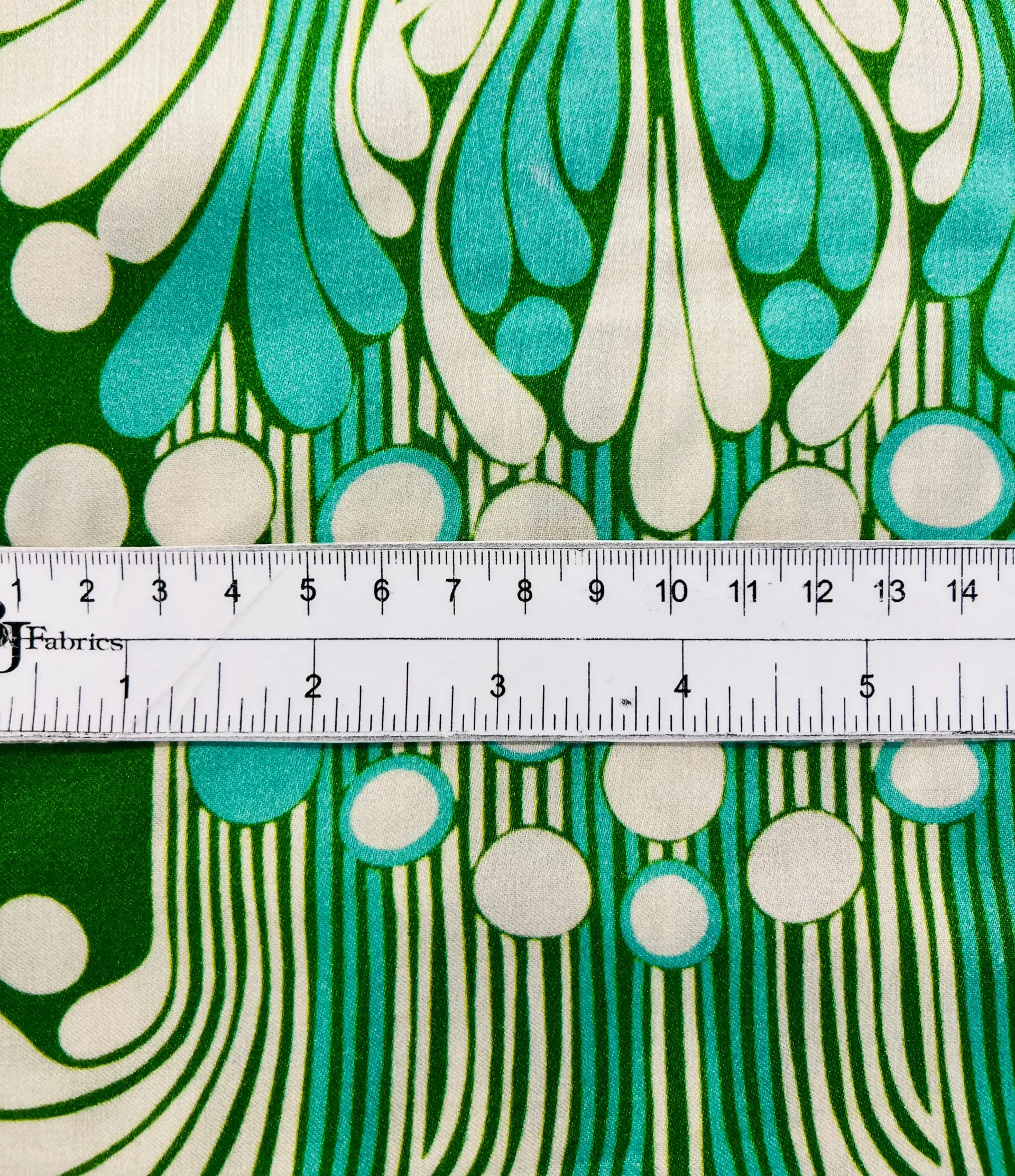 Printed Viscose Challis Sateen on Green Ground