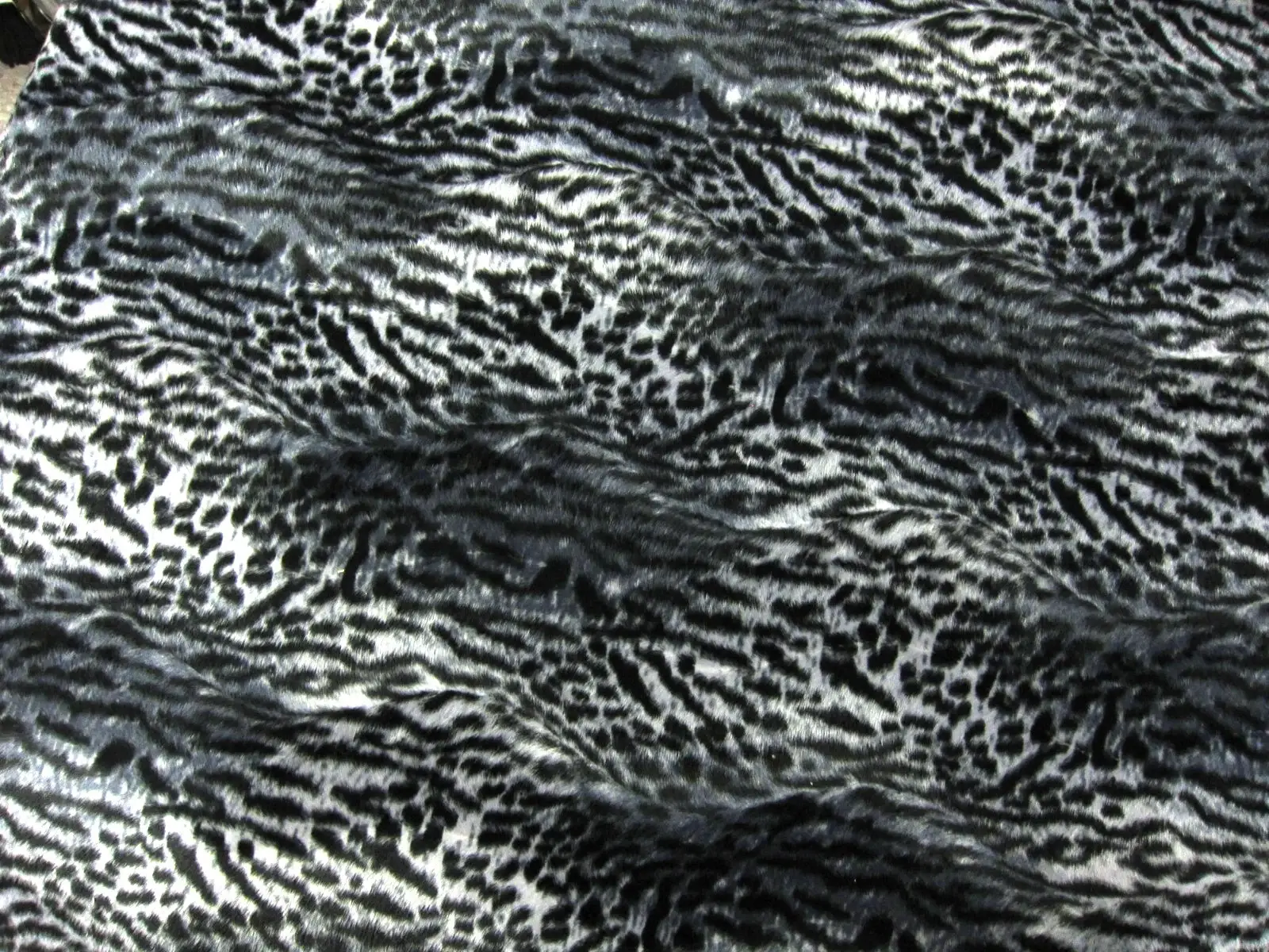 Pleather Backed Faux Fur0