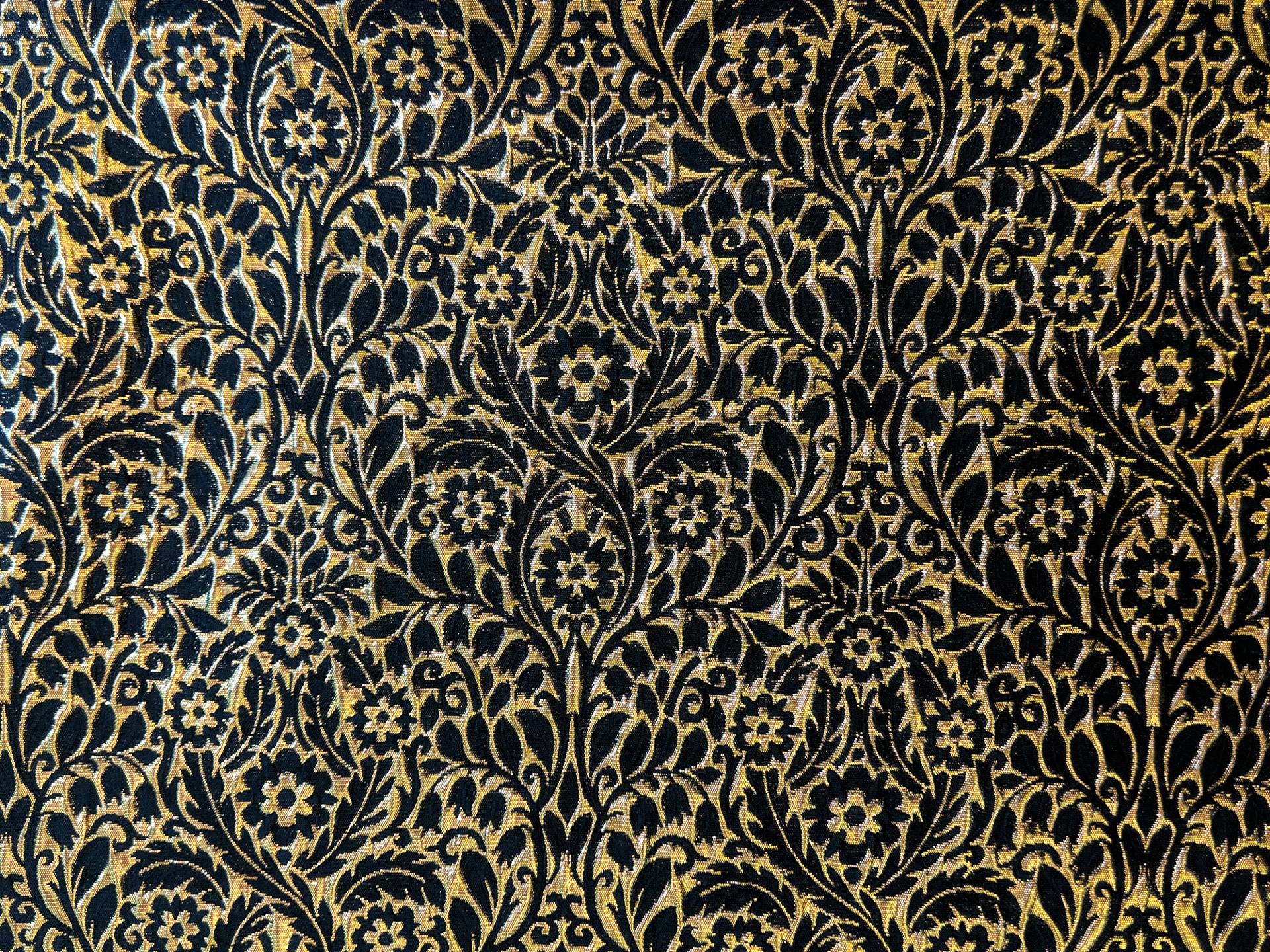 Metallic Brocade with Heavy Floral Ornamentation with Black Accents