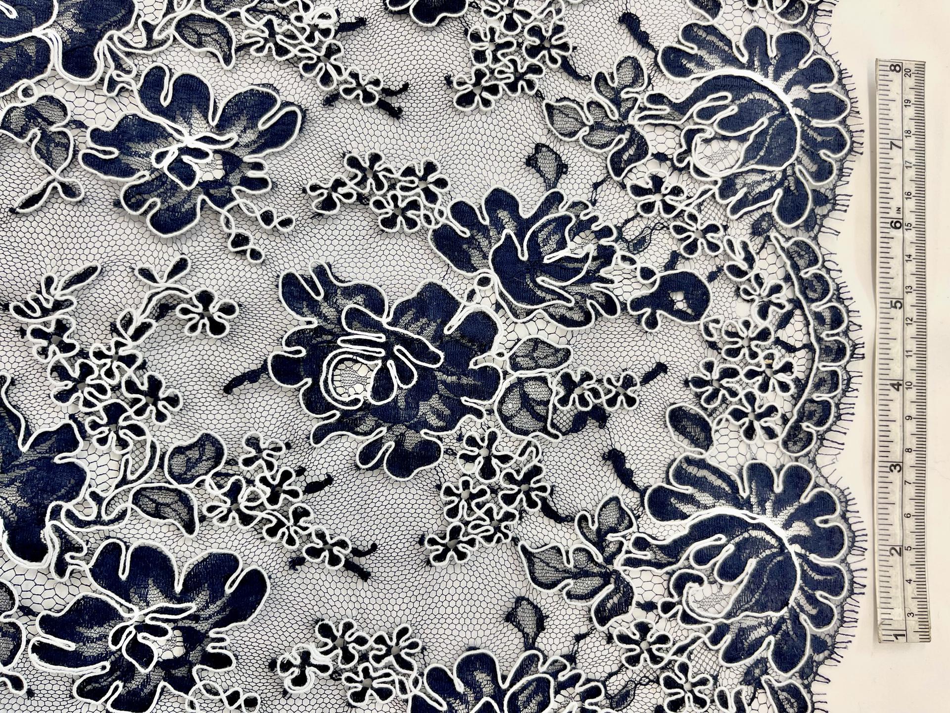 French Navy Blue Alençon Lace with Roses Outlined by White Cordings.