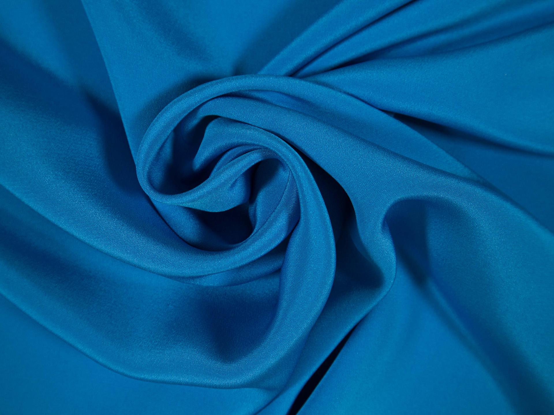 4-ply silk crepe in lagoon draped