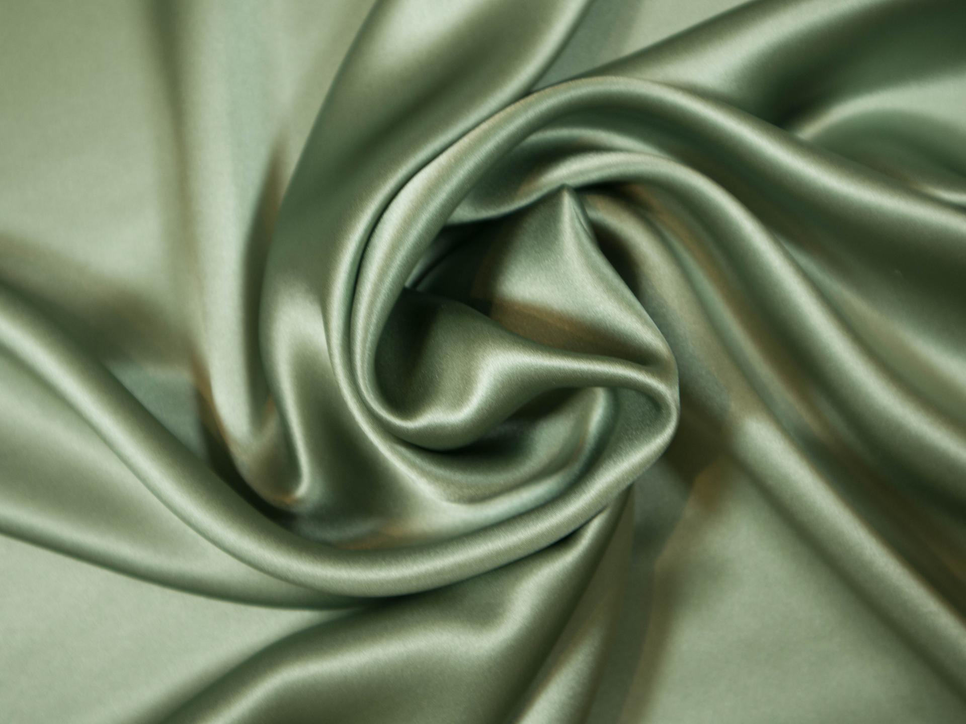 Solid silk charmuese in dill - draped
