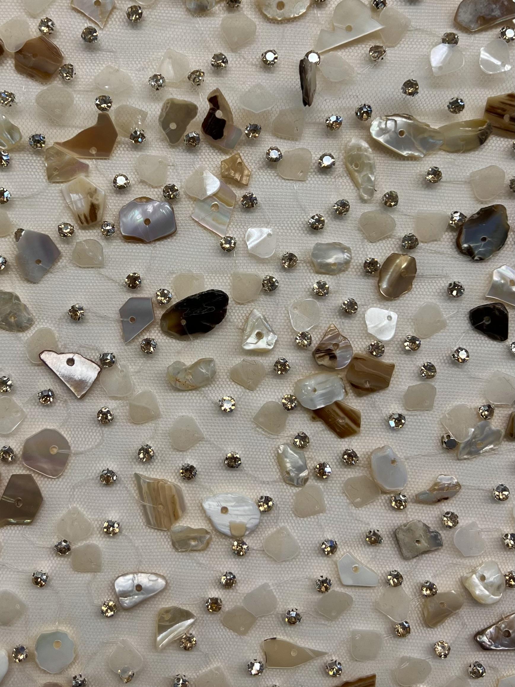 Hand Sewn Mother of Pearl and Crystal on Nude Tulle