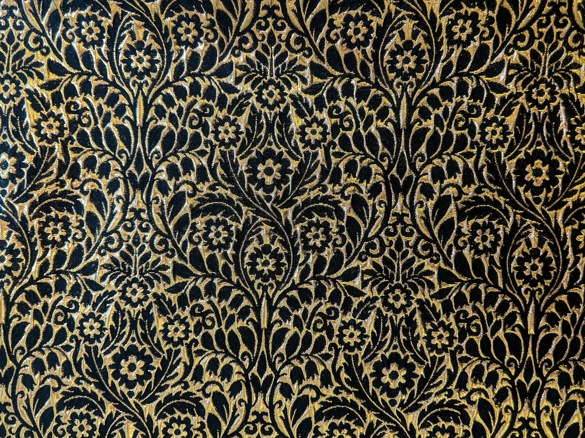 Metallic Brocade with Heavy Floral Ornamentation with Black Accents