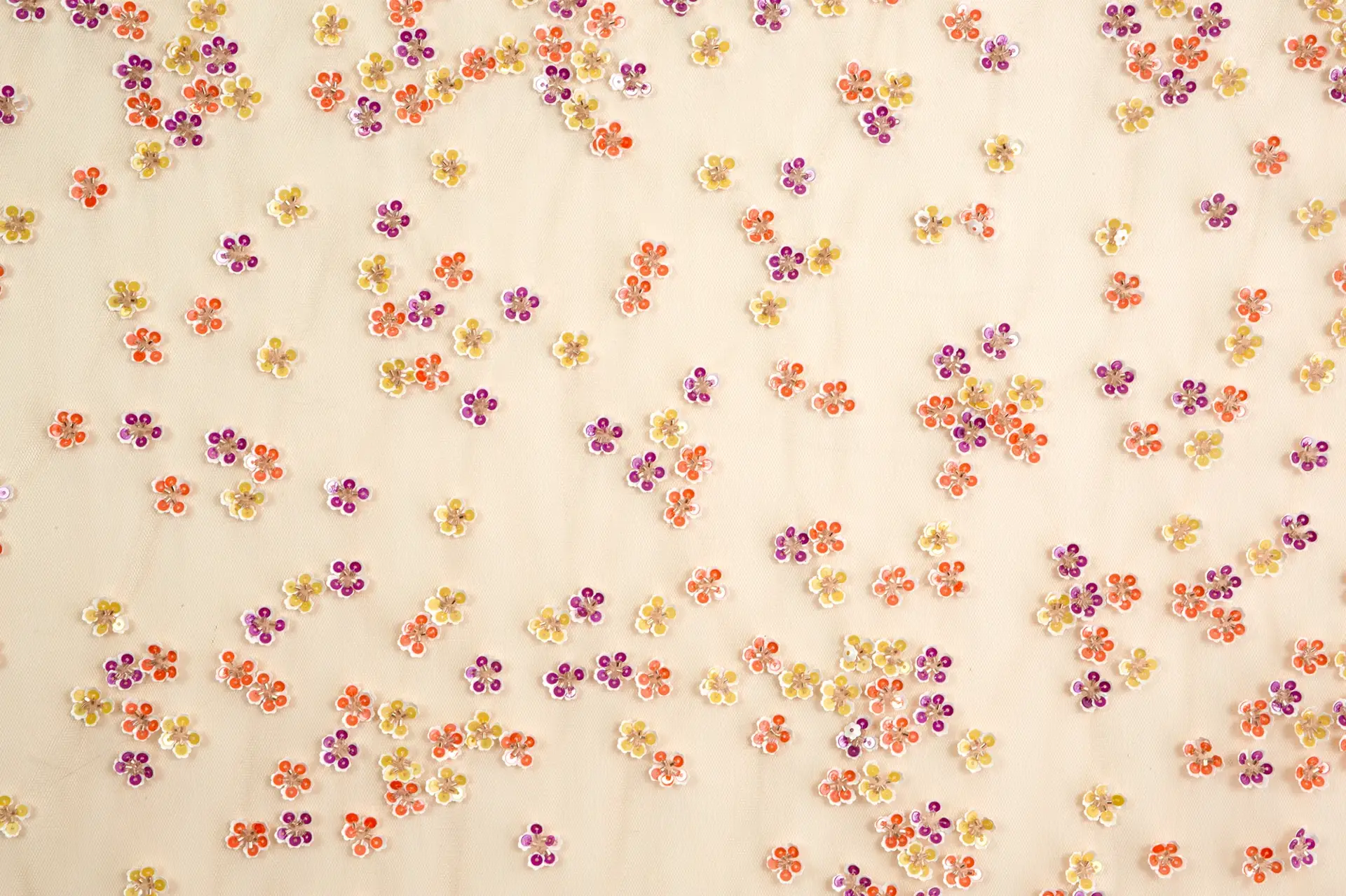 Novelty Sequined Flowers on Peach Tulle