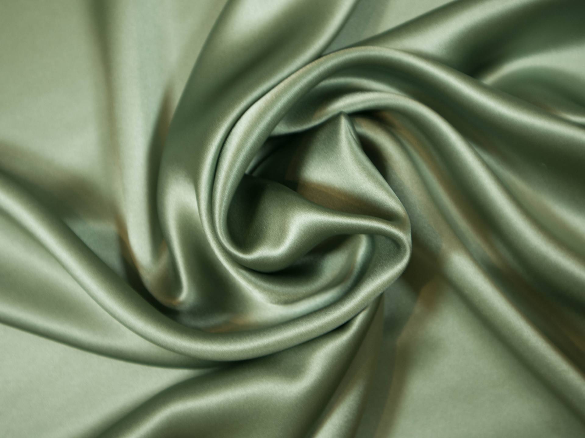 Solid silk charmuese in dill - draped