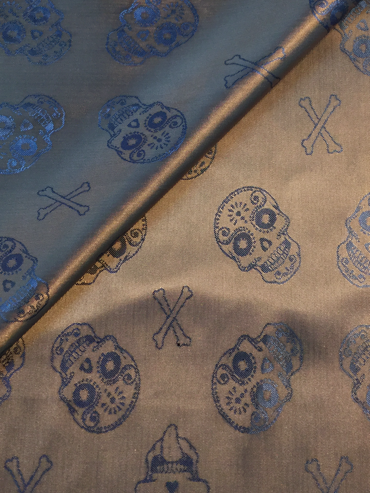 Novelty Jacquard Lining in Bronze/Blue w/ Skulls