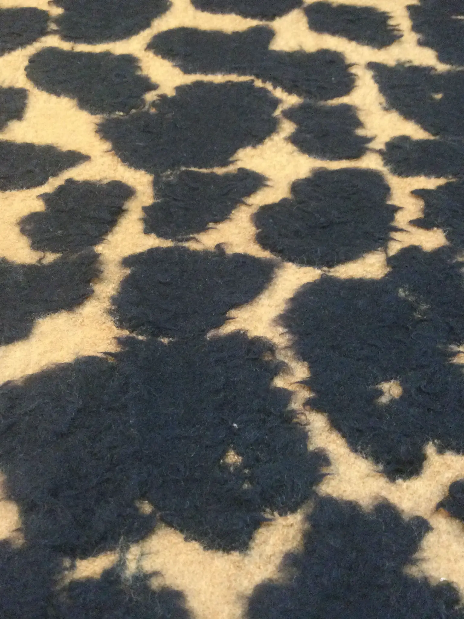 Italian Wool Novelty In Animal Pattern in Camel Black