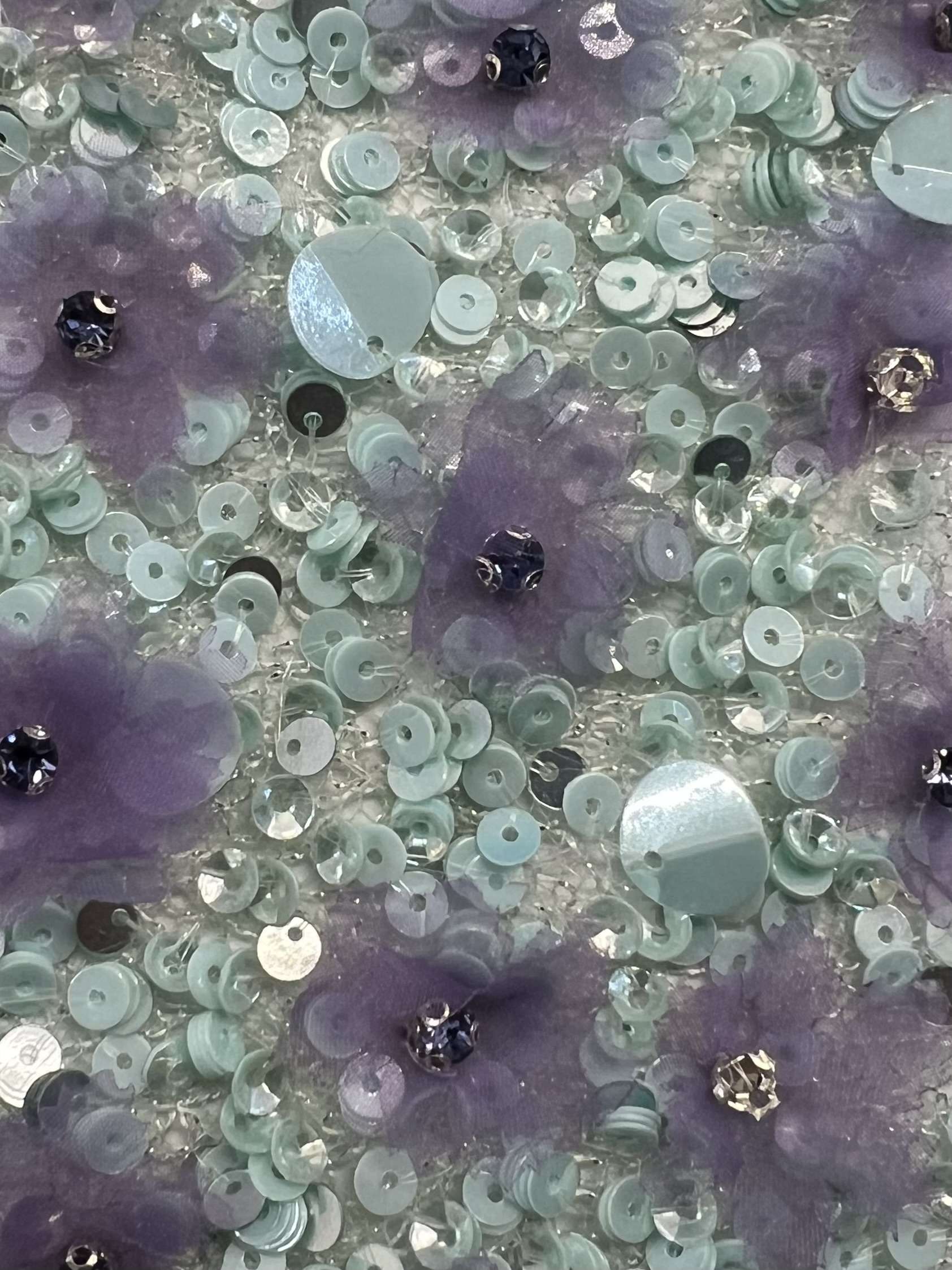 Metallic Novelty Green Net with Hand Sewn Sequin & Paillettes and Laser Cut Lavender Flowers.