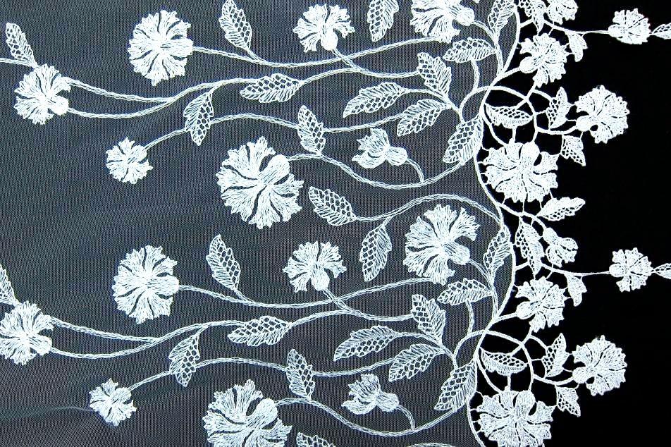 EMBROIDERED ILLUSION