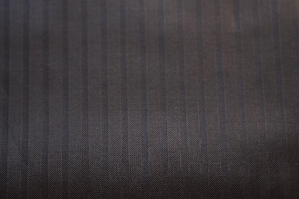 LAQUERED WOOL SUITING