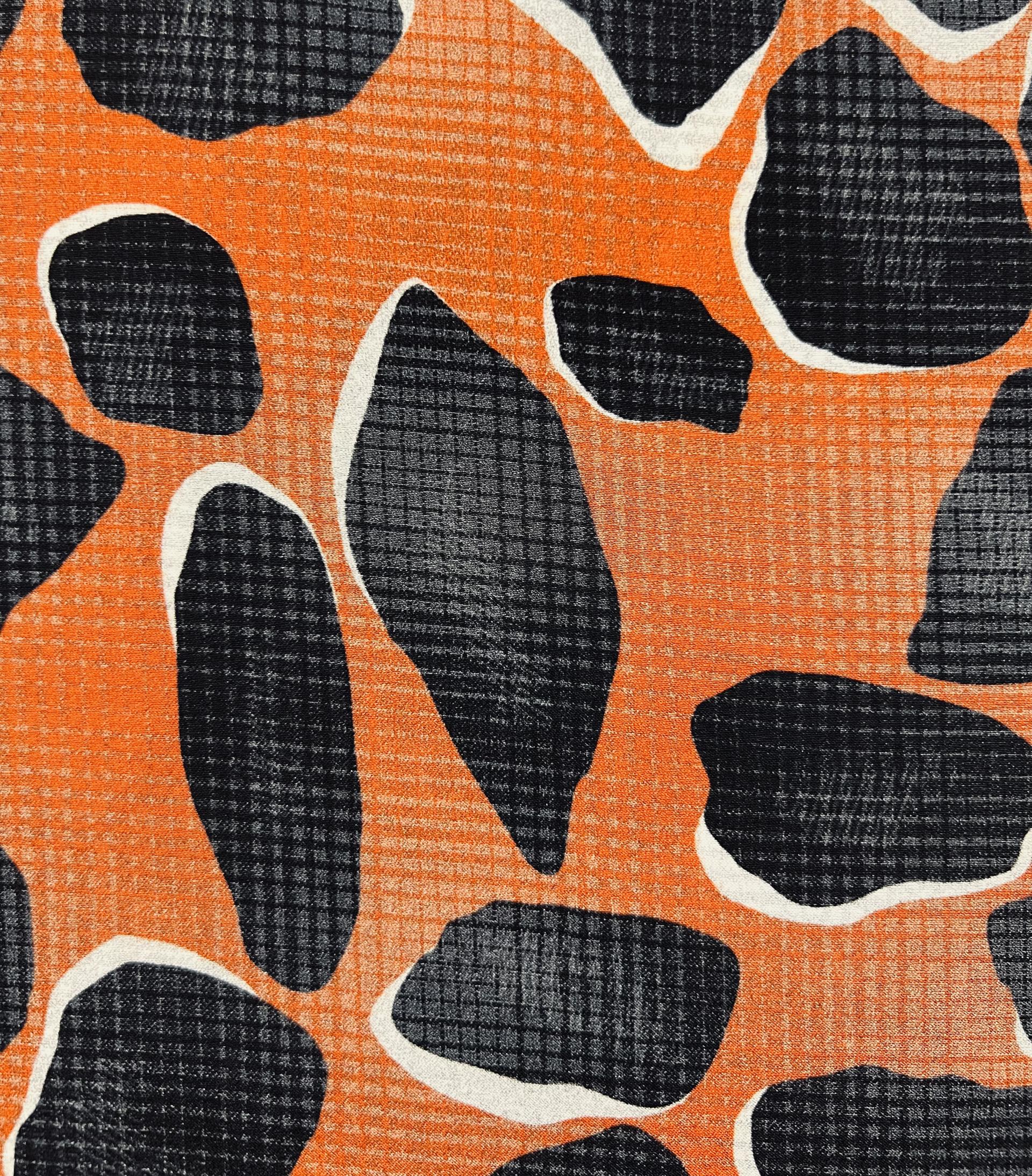 Printed Stretch Silk Charmeuse on Rust Ground