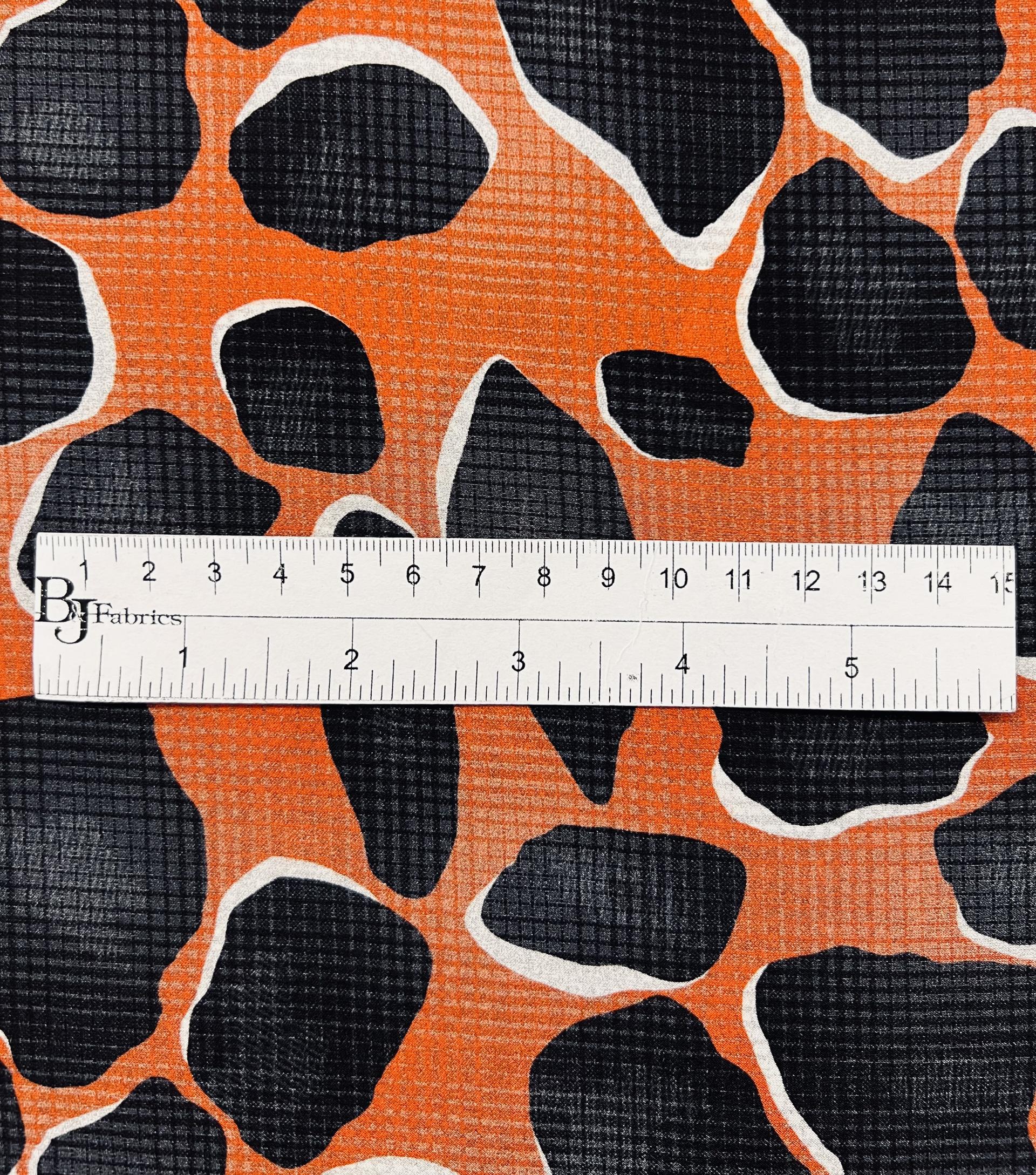 Printed Stretch Silk Charmeuse on Rust Ground