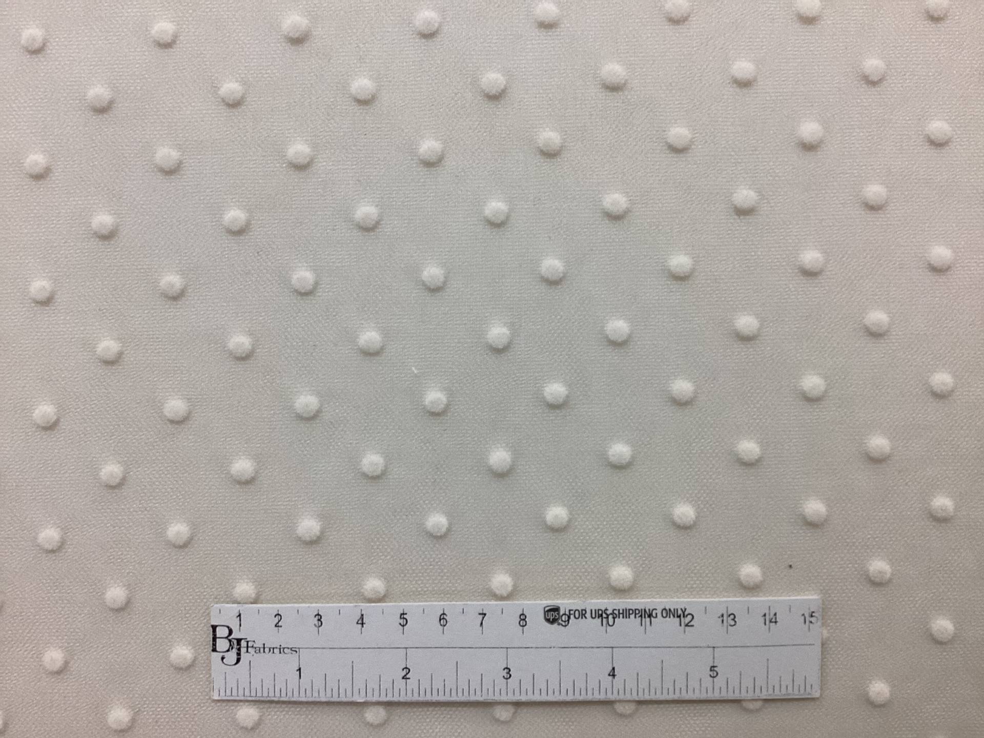 Flocked Nylon tulle in Nude with White Dots