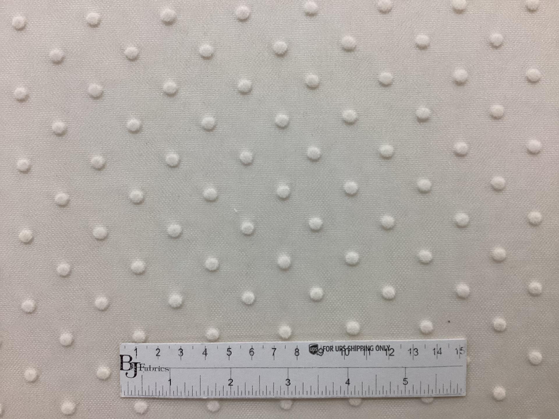 Flocked Nylon tulle in Nude with White Dots