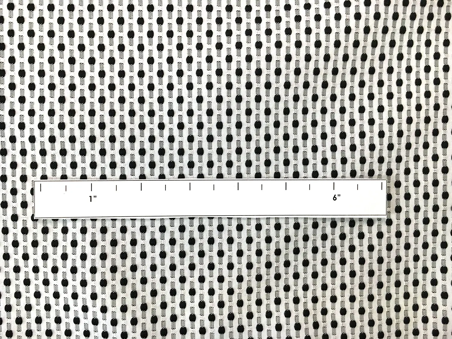 Polyester Swiss Dot Brocade with Black Dots1