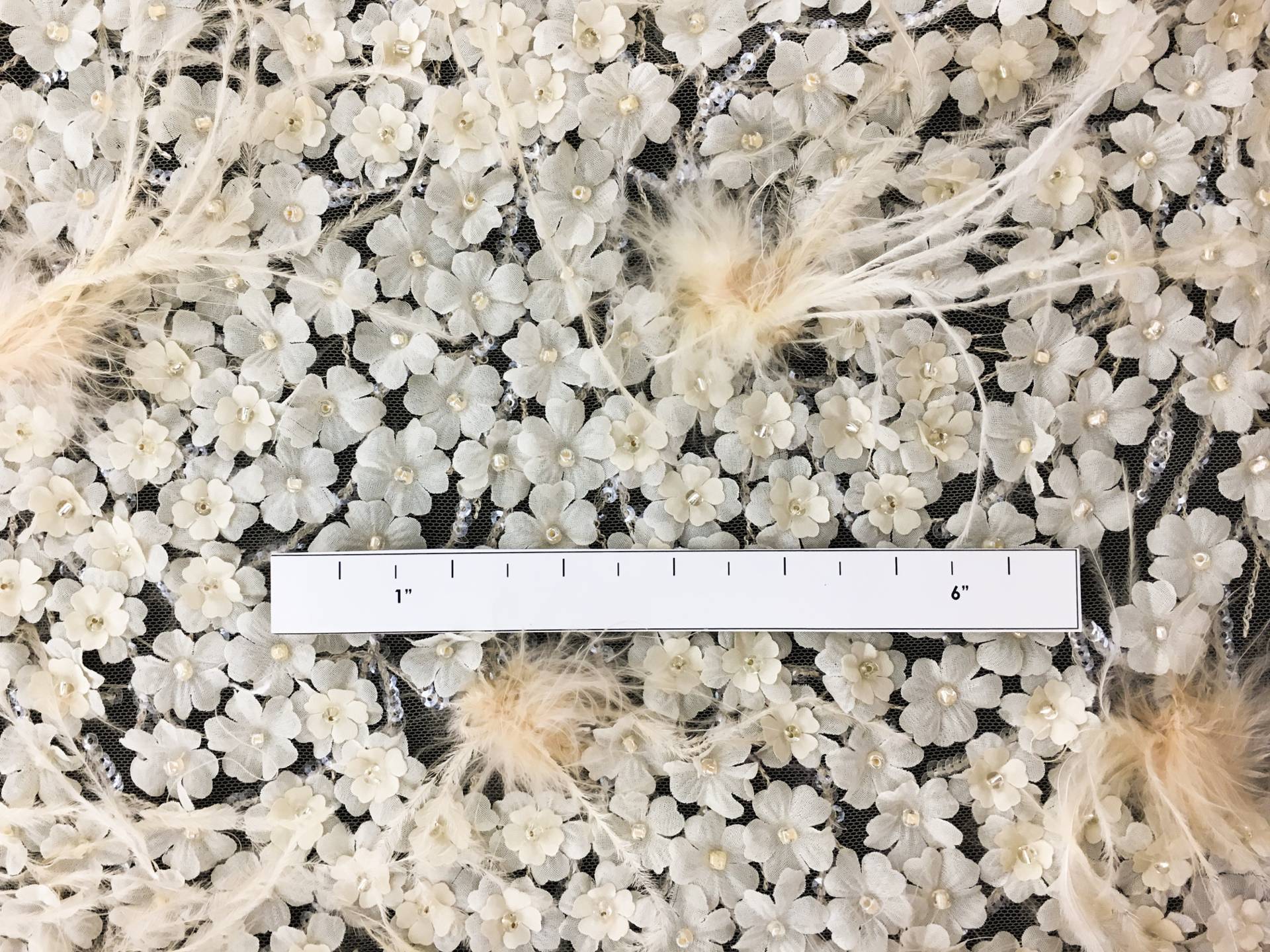 Beaded and Embroidered Tulle with Appliqued Flowers and Feathers in Triangle Patterns1
